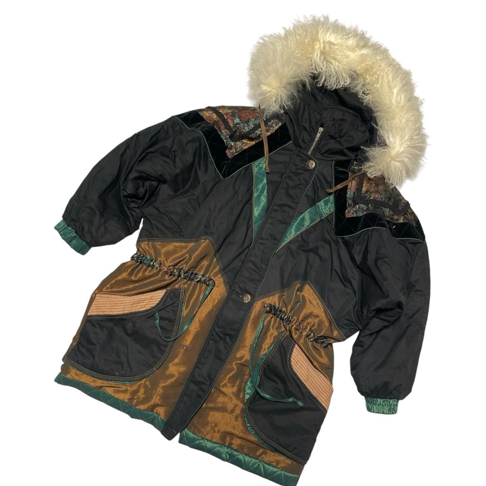 Iconic shiny coat with velvet accents and removable fur hood.